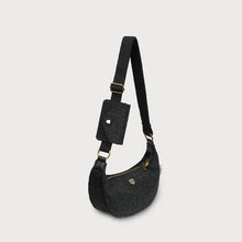 Load image into Gallery viewer, Black shoulder bag with a strap on a light gray background
